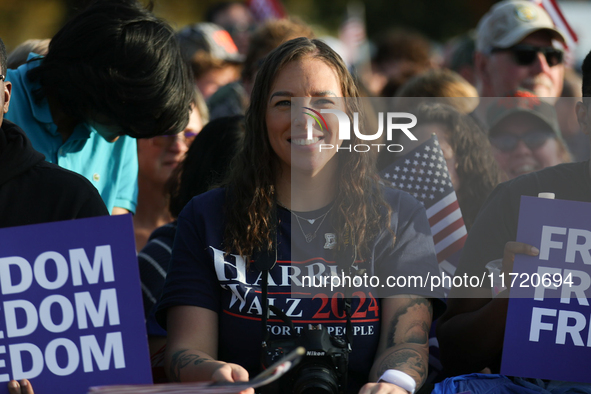 Supporters of Vice President Kamala Harris wait for a campaign rally to begin on the Ellipse in Washington, D.C. on October 29, 2024. 