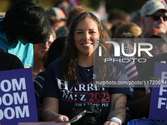 Supporters of Vice President Kamala Harris wait for a campaign rally to begin on the Ellipse in Washington, D.C. on October 29, 2024. (