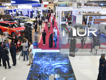 A general view shows people visiting after the opening ceremony of the 15th edition of the Milipol Qatar 2024 Exhibition and Conference in D...