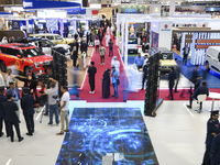 A general view shows people visiting after the opening ceremony of the 15th edition of the Milipol Qatar 2024 Exhibition and Conference in D...