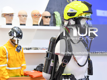 A photo shows a protective helmet at the 15th edition of the Milipol Qatar 2024 Exhibition and Conference in Doha, Qatar, on October 29, 202...