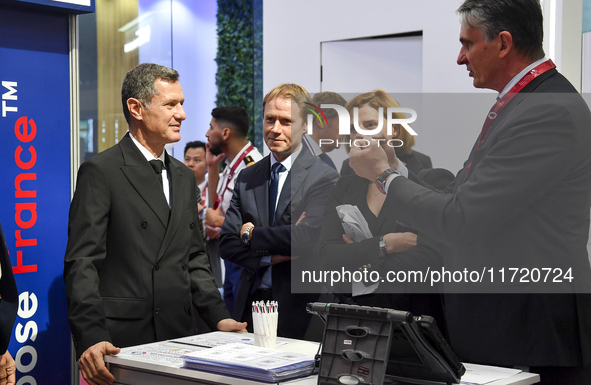 Nicolas Daragon, Minister Delegate for Everyday Security at the Ministry of Interior in France, visits the France booth after the opening ce...