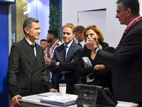 Nicolas Daragon, Minister Delegate for Everyday Security at the Ministry of Interior in France, visits the France booth after the opening ce...