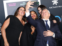 Karla Sofia Gascon, Zoe Saldana, Selena Gomez and Ted Sarandos arrive at The French American Film Festival - Opening Night Premiere Of Netfl...