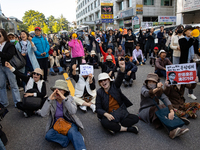 Hundreds of party members and supporters hold a protest demanding the resignation of leader Han Dong-hoon, alleging he takes an independent...