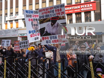 Hundreds of party members and supporters hold a protest demanding the resignation of leader Han Dong-hoon, alleging he takes an independent...