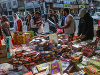 Customers buy firecrackers at a market ahead of Diwali, the Hindu festival of lights, in Srinagar, Jammu and Kashmir, on October 30, 2024. (