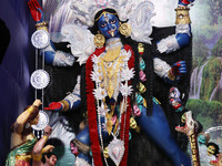 A huge clay idol of the Hindu goddess Kali is inside a ''pandal'' (a temporary platform), a decorated structure, ahead of the Kali Puja fest...