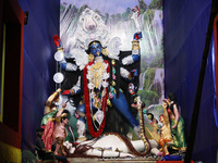 A huge clay idol of the Hindu goddess Kali is inside a ''pandal'' (a temporary platform), a decorated structure, ahead of the Kali Puja fest...