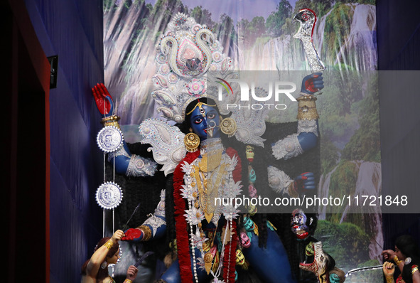 A huge clay idol of the Hindu goddess Kali is inside a ''pandal'' (a temporary platform), a decorated structure, ahead of the Kali Puja fest...