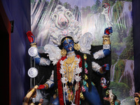 A huge clay idol of the Hindu goddess Kali is inside a ''pandal'' (a temporary platform), a decorated structure, ahead of the Kali Puja fest...