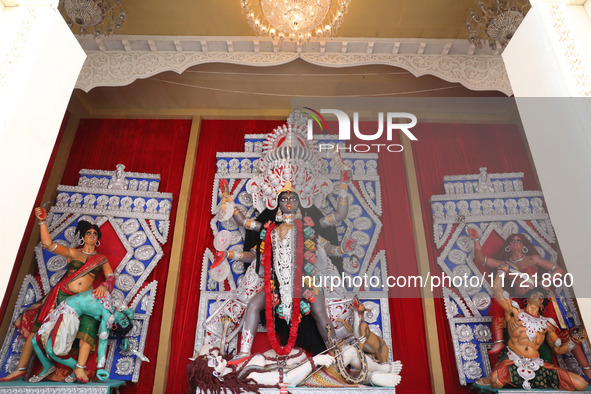 A huge clay idol of the Hindu goddess Kali is inside a ''pandal'' (a temporary platform), a decorated structure, ahead of the Kali Puja fest...