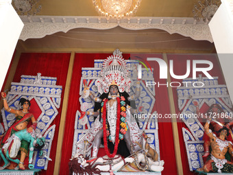 A huge clay idol of the Hindu goddess Kali is inside a ''pandal'' (a temporary platform), a decorated structure, ahead of the Kali Puja fest...