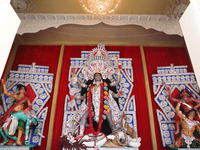 A huge clay idol of the Hindu goddess Kali is inside a ''pandal'' (a temporary platform), a decorated structure, ahead of the Kali Puja fest...