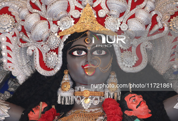 A huge clay idol of the Hindu goddess Kali is inside a ''pandal'' (a temporary platform), a decorated structure, ahead of the Kali Puja fest...