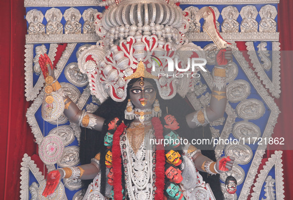 A huge clay idol of the Hindu goddess Kali is inside a ''pandal'' (a temporary platform), a decorated structure, ahead of the Kali Puja fest...