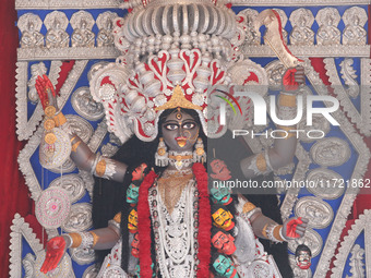 A huge clay idol of the Hindu goddess Kali is inside a ''pandal'' (a temporary platform), a decorated structure, ahead of the Kali Puja fest...