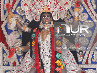 A huge clay idol of the Hindu goddess Kali is inside a ''pandal'' (a temporary platform), a decorated structure, ahead of the Kali Puja fest...