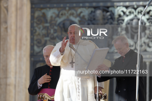 Pope Francis blesses the crowd at the end of his weekly general audience at St Peter's Square in The Vatican on October 30, 2024. 