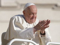 Pope Francis greets the crowd at the end of the weekly general audience at St. Peter's Square in The Vatican on October 30, 2024. (