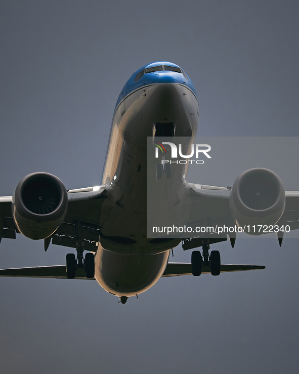 A Neos Air Boeing 737 Max descends during sunset at Bari Airport in Bari, Italy, on March 27, 2022. 