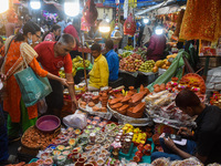 People buy clay lamps at a market ahead of the Diwali festival in Kolkata, India, on October 30, 2024. (