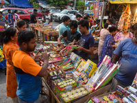 A shopkeeper sells firecrackers at a market ahead of the Diwali festival in Kolkata, India, on October 30, 2024. (