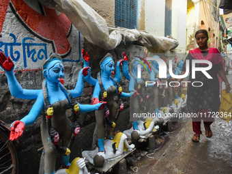 Rows of idols of Goddess Kali are on display for sale ahead of the Kali Puja festival in Kolkata, India, on October 30, 2024. (