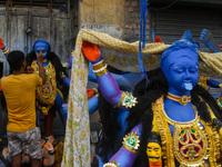 Artisans give final touches to idols of Goddess Kali ahead of the Kali Puja festival celebration in Kolkata, India, on October 30, 2024. (