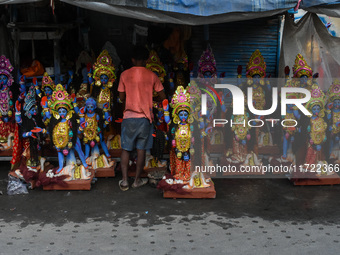 Artisans give final touches to idols of Goddess Kali ahead of the Kali Puja festival celebration in Kolkata, India, on October 30, 2024. (