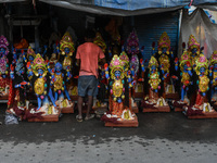 Artisans give final touches to idols of Goddess Kali ahead of the Kali Puja festival celebration in Kolkata, India, on October 30, 2024. (