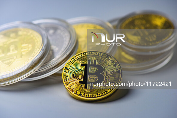 HUAI'AN, CHINA - OCTOBER 30, 2024 - Bitcoin model commemorative coins are displayed in Huai 'an city, Jiangsu province, China, Oct 30, 2024....