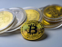 HUAI'AN, CHINA - OCTOBER 30, 2024 - Bitcoin model commemorative coins are displayed in Huai 'an city, Jiangsu province, China, Oct 30, 2024....