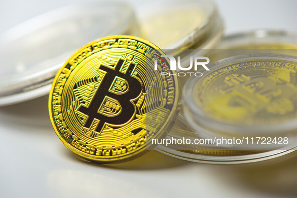 HUAI'AN, CHINA - OCTOBER 30, 2024 - Bitcoin model commemorative coins are displayed in Huai 'an city, Jiangsu province, China, Oct 30, 2024....