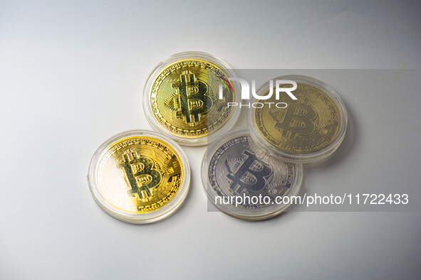 HUAI'AN, CHINA - OCTOBER 30, 2024 - Bitcoin model commemorative coins are displayed in Huai 'an city, Jiangsu province, China, Oct 30, 2024....