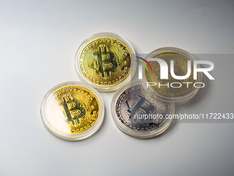 HUAI'AN, CHINA - OCTOBER 30, 2024 - Bitcoin model commemorative coins are displayed in Huai 'an city, Jiangsu province, China, Oct 30, 2024....