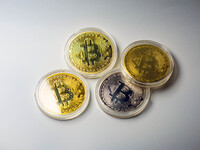 HUAI'AN, CHINA - OCTOBER 30, 2024 - Bitcoin model commemorative coins are displayed in Huai 'an city, Jiangsu province, China, Oct 30, 2024....