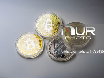 Bitcoin model commemorative coins are displayed in Huai'an, China, on October 30, 2024. (