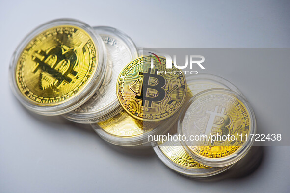 HUAI'AN, CHINA - OCTOBER 30, 2024 - Bitcoin model commemorative coins are displayed in Huai 'an city, Jiangsu province, China, Oct 30, 2024....