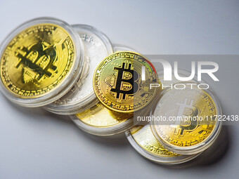 HUAI'AN, CHINA - OCTOBER 30, 2024 - Bitcoin model commemorative coins are displayed in Huai 'an city, Jiangsu province, China, Oct 30, 2024....