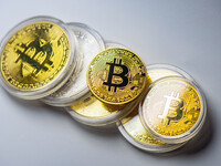 HUAI'AN, CHINA - OCTOBER 30, 2024 - Bitcoin model commemorative coins are displayed in Huai 'an city, Jiangsu province, China, Oct 30, 2024....