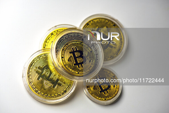 Bitcoin model commemorative coins are displayed in Huai'an, China, on October 30, 2024. 