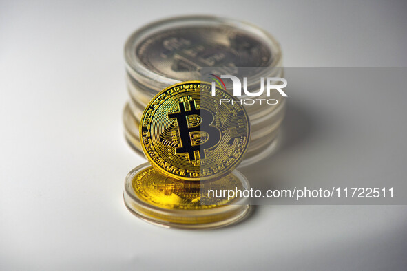 HUAI'AN, CHINA - OCTOBER 30, 2024 - Bitcoin model commemorative coins are displayed in Huai 'an city, Jiangsu province, China, Oct 30, 2024....