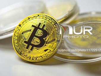 HUAI'AN, CHINA - OCTOBER 30, 2024 - Bitcoin model commemorative coins are displayed in Huai 'an city, Jiangsu province, China, Oct 30, 2024....