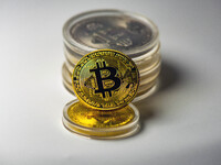 HUAI'AN, CHINA - OCTOBER 30, 2024 - Bitcoin model commemorative coins are displayed in Huai 'an city, Jiangsu province, China, Oct 30, 2024....