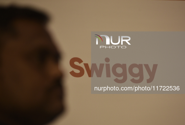 A Swiggy sign is seen during a press conference announcing its forthcoming Initial Public Offering (IPO) in Mumbai, India, on October 30, 20...