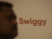 A Swiggy sign is seen during a press conference announcing its forthcoming Initial Public Offering (IPO) in Mumbai, India, on October 30, 20...