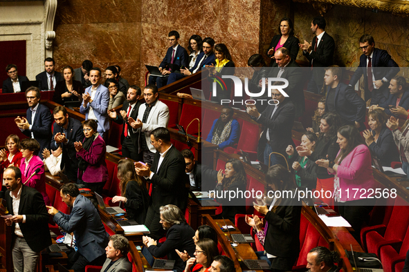 In Paris, France, on October 29, 2024, deputies of the La France Insoumise group applaud the speech of Manuel Bompard during the public sess...