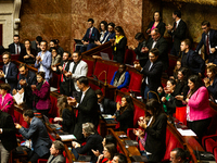 In Paris, France, on October 29, 2024, deputies of the La France Insoumise group applaud the speech of Manuel Bompard during the public sess...