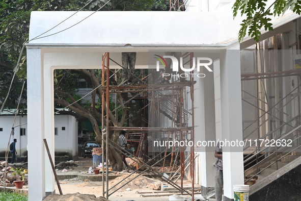 Workers renovate the main building of the International Criminal Tribunal in Dhaka, Bangladesh, on October 30, 2024. 